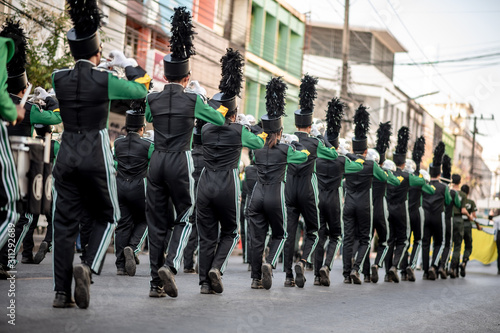 Close up and details of playing musicians, instruments in a marching, show band or music band