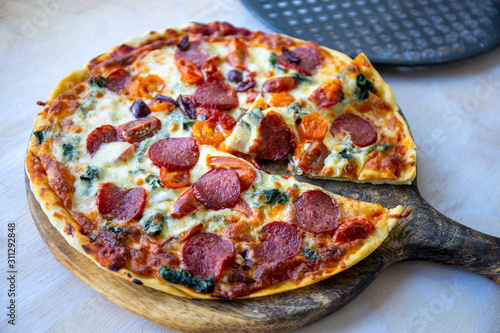 Chorizo, tomato and mozzarella cheese pizza