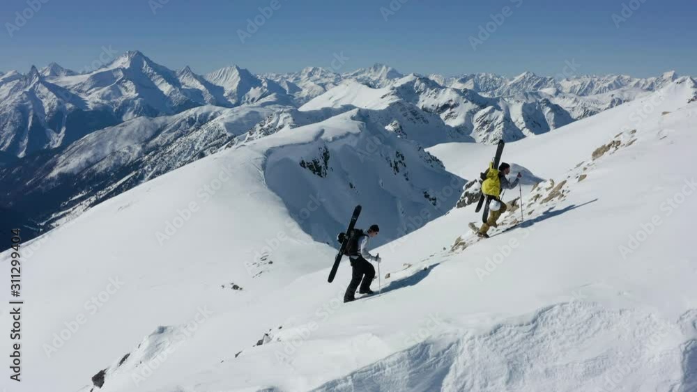 Winter mountain ridge hike in British Columbia, Canada by drone. Winter mountain ridge hike in British Columbia, Canada by drone.