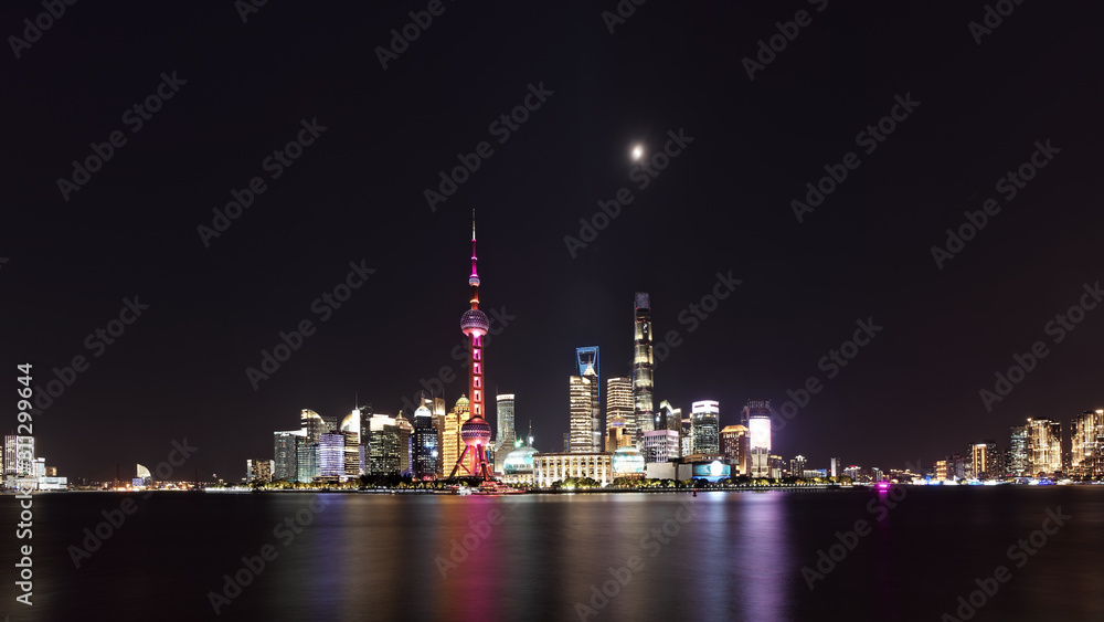 Skyline view from Bund waterfront on Pudong New Area at night, Lujiazui is the business quarter of Shanghai.
