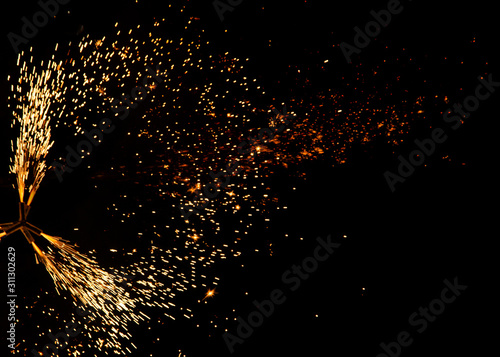 fireworks sparks on black background photo