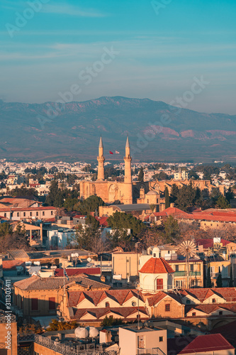 Obraz na płótnie Beautiful aerial view over old town of Nicosia, Northern Cyprus and Selimiye Mosque in Cyprus w salonie