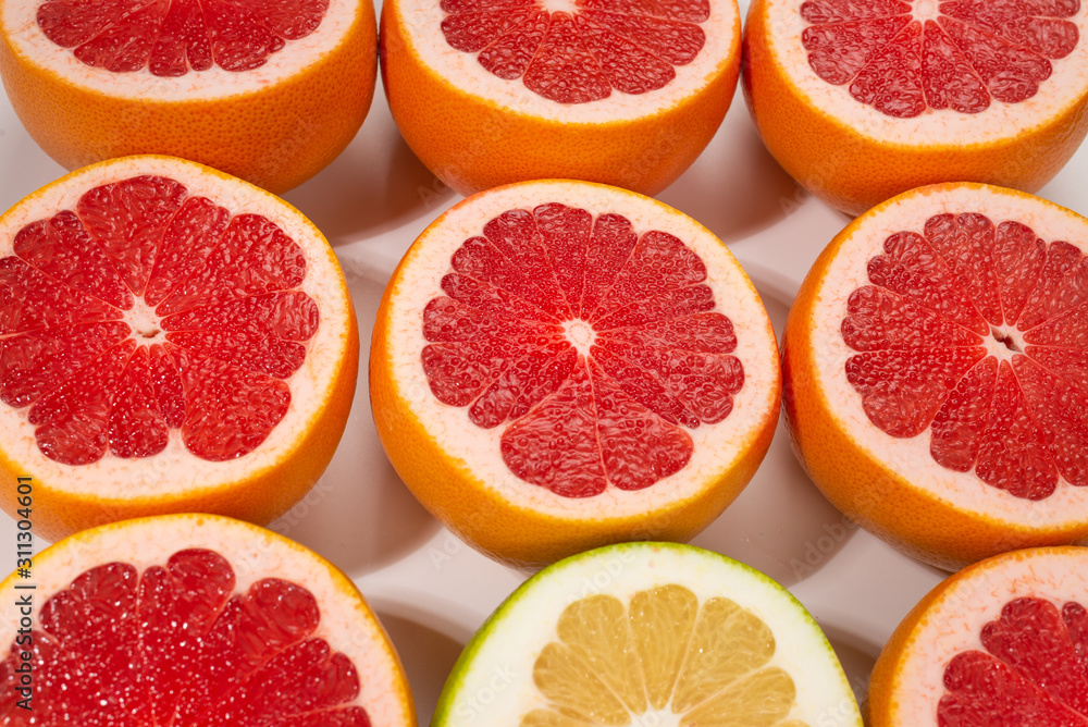 Pomelo and grapefruit slices background. Pomelo and grapefruit slices background.