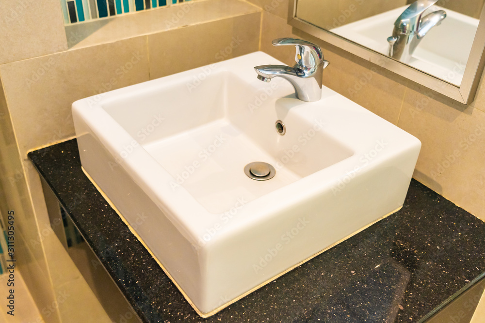 Water facuet and white sink decoration interior Water facuet and white sink decoration interior