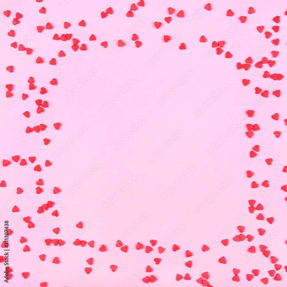 Pink background with red hearts. Valentine's day concept.