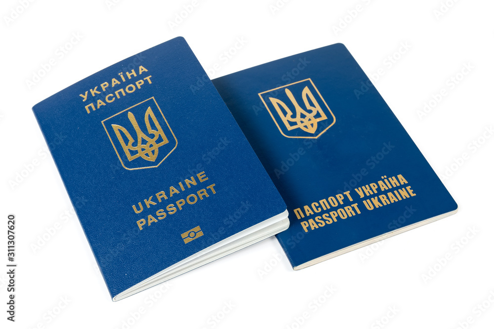 Biometric and non-biometric Ukrainian passports on a white background Biometric and non-biometric Ukrainian passports on a white background