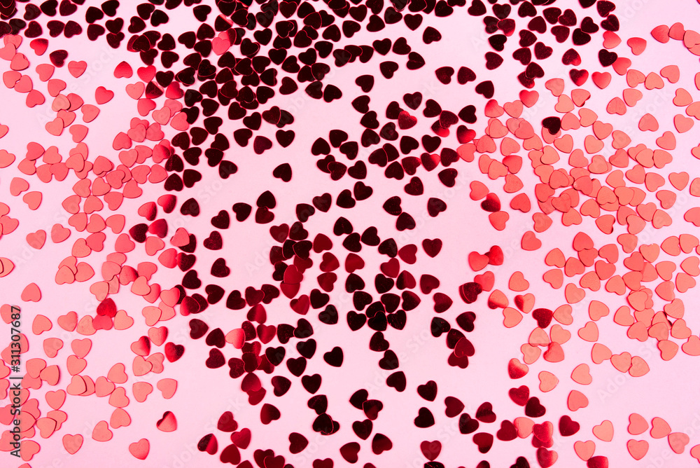 Pink background with red hearts. Valentine's day concept. Top view. Pink background with red hearts. Valentine's day concept. Top view.