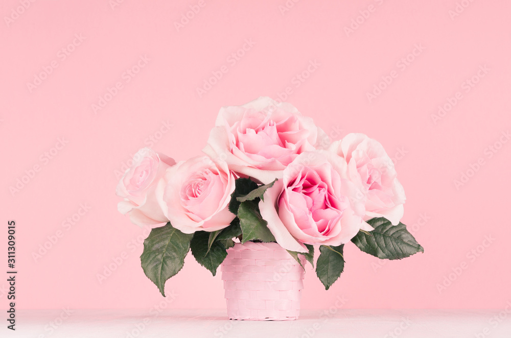 Summer rich exquisite roses bouquet in pink color on white wood table.