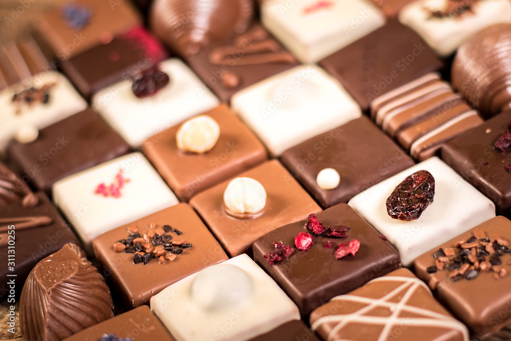 Assortment of fine chocolate candies, white, dark and milk chocolate