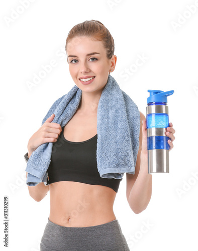 Sporty young woman with bot...