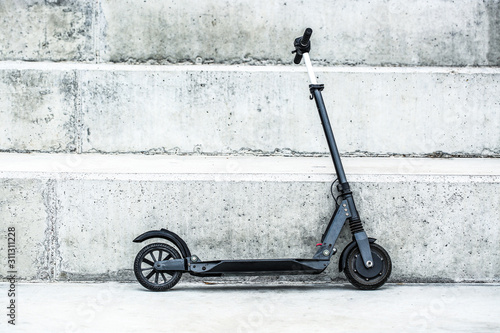 Modern electric kick scooter outdoors