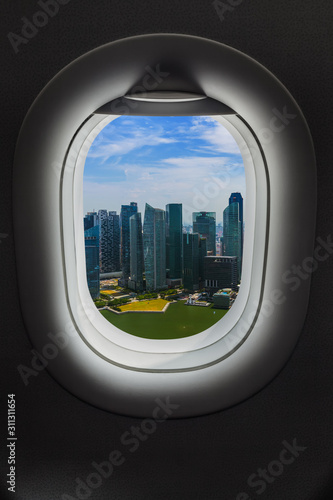 Photography Singapore in airplane window