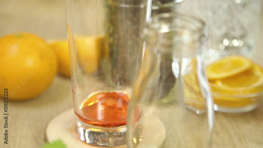 Pour Viscous Syrup From Jigger To Glass - Close Up Pour Viscous Syrup From Jigger To Glass - Close Up