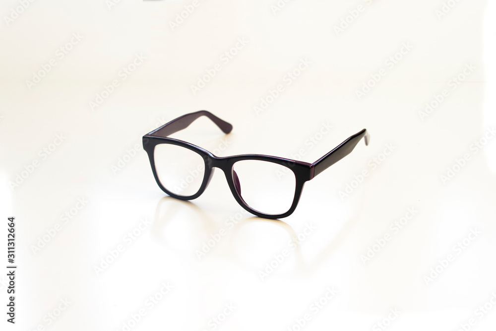 Stock photo of glasses on a white background. A view of the trichverty. A place for your text. Stock photo of glasses on a white background. A view of the trichverty. A place for your text.