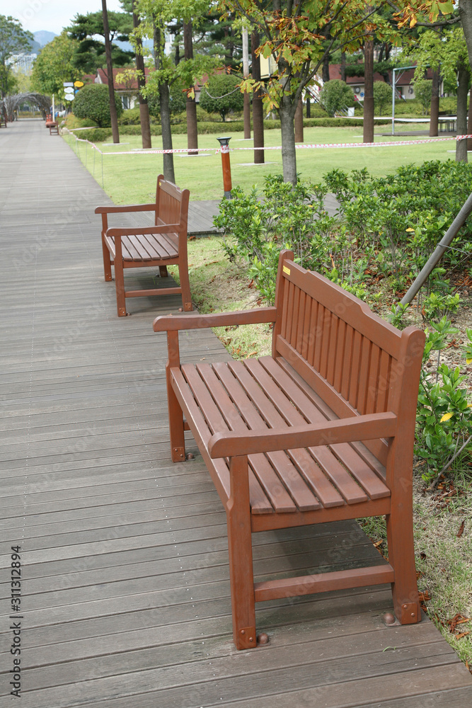 Bench in an empty park.  Busan citizens park.