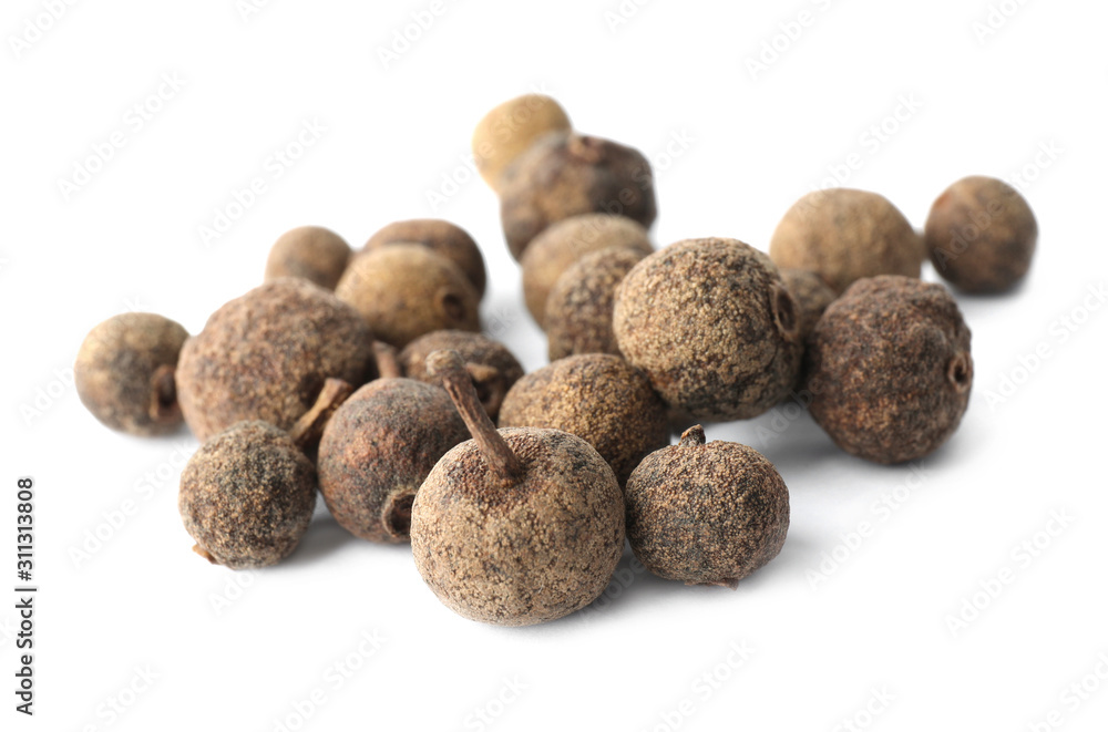 Heap of black pepper grains isolated on white Heap of black pepper grains isolated on white