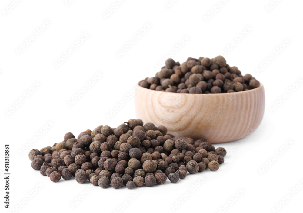 Spicy black pepper grains isolated on white Spicy black pepper grains isolated on white