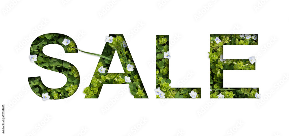 Summer sale. Real floral letters made of fresh grass. The effect of cut paper Summer sale. Real floral letters made of fresh grass. The effect of cut paper