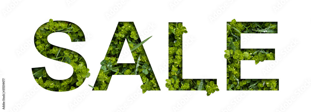 Summer sale. Real floral letters made of fresh grass. The effect of cut paper Summer sale. Real floral letters made of fresh grass. The effect of cut paper