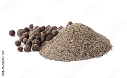 Spicy milled and whole black pepper isolated on white