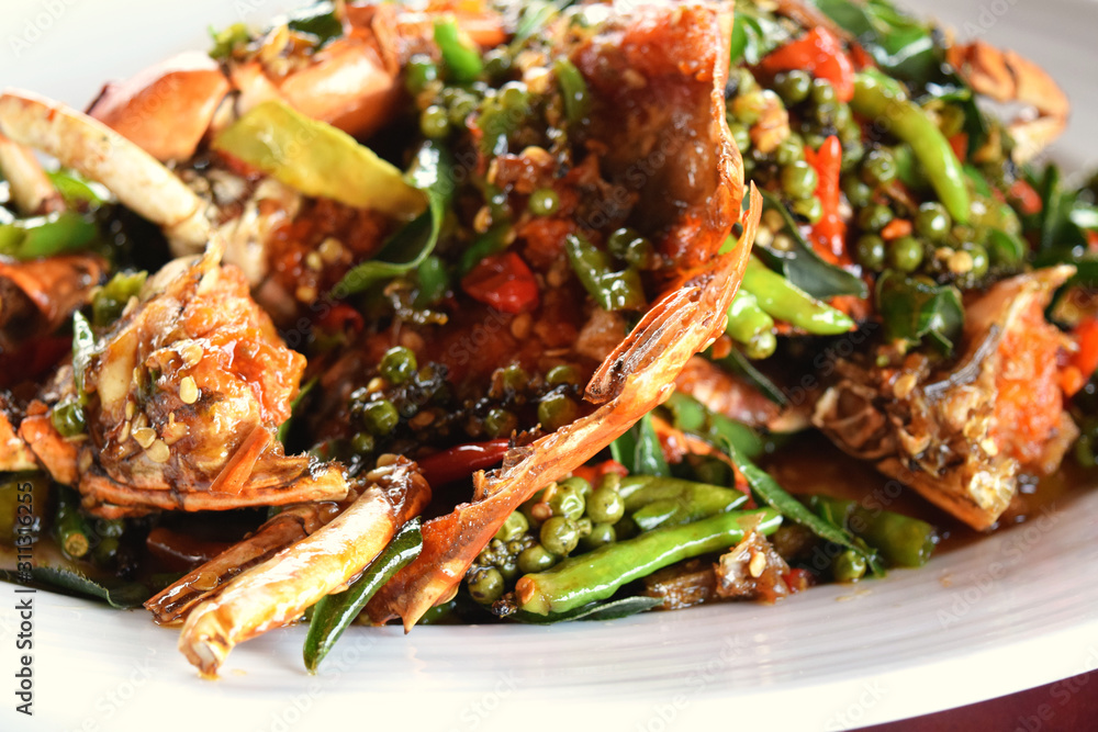 Picture of stir-fried crab meat with black pepper, very tasty in a restaurant in Samut Sakhon Province, Thailand Picture of stir-fried crab meat with black pepper, very tasty in a restaurant in Samut Sakhon Province, Thailand
