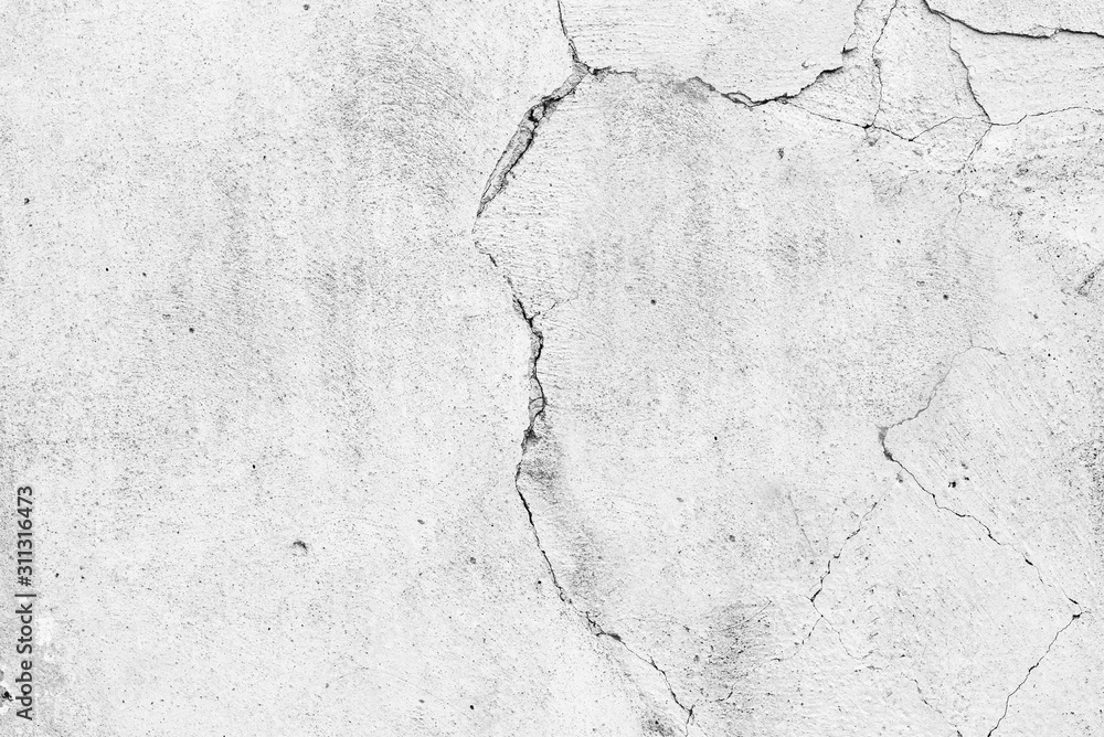 Texture of a concrete wall with cracks and scratches which can be used as a background Texture of a concrete wall with cracks and scratches which can be used as a background
