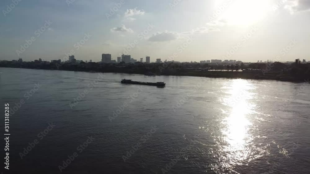 Aerial Dark Silhouette inland Ship Vessel Floats Calm River Lake Orange Sunset Aerial Dark Silhouette inland Ship Vessel Floats Calm River Lake Orange Sunset