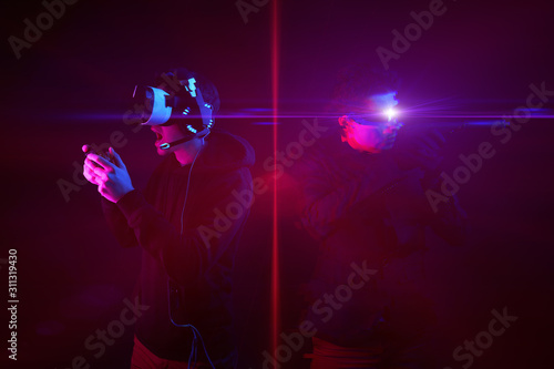 Man with virtual reality headset and gamepad and his virtual gaming avatar. Image with glitch effect.