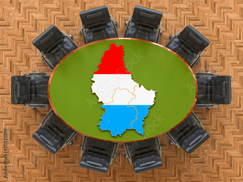 Luxembourgish goverment meeting. Map of Luxembourg on the round table, 3D rendering photo