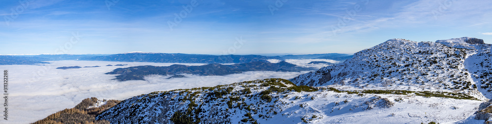 Panoramic view of the Julian Alps with Triglav mountain from the top of the Peca mountain, Slovenia