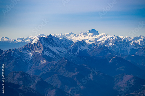 Panoramic view of the Julian Alps with Triglav mountain from the top of the Peca mountain, Slovenia © erikzunec