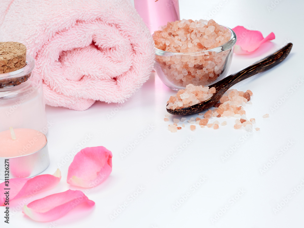 Spa of rose oil, pink himalayan salt.
