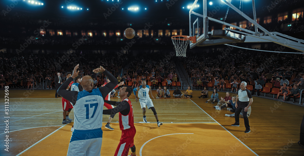 Fototapeta premium Basketball players on big professional arena during the game. Tense moment of the game. Celebration