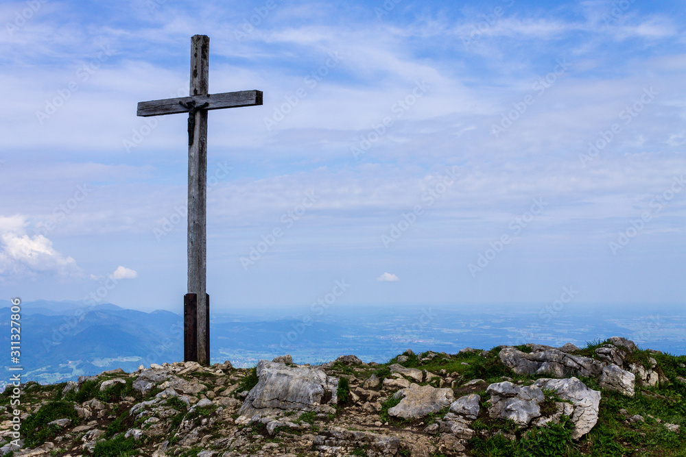 Peak and Summit Cross of Mount Hochries, 1596 m in Chiemgauer Alps, Ostalpen, located in Samerberg, Upper Bavaria, Germany