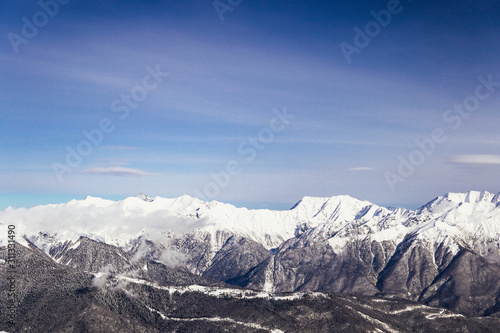 snow mountains, blue sky winter ski resort © dmitriisimakov