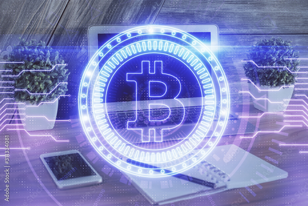 Double exposure of blockchain theme hologram and table with computer background. Concept of bitcoin crypto currency. Double exposure of blockchain theme hologram and table with computer background. Concept of bitcoin crypto currency.
