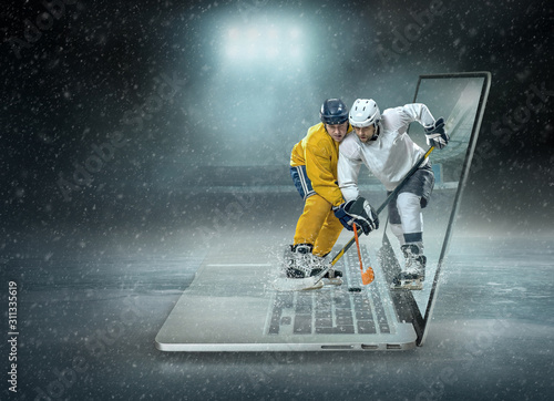Photography Caucassian ice hockey Players in dynamic action in a professiona