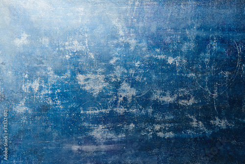 Shabby abstract retro blue background. Aged vintage grunge texture with scratches and damage