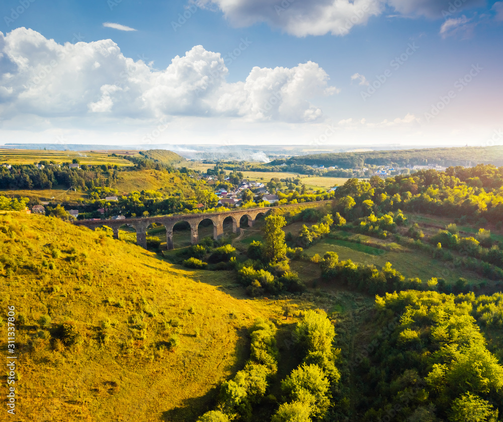 Aerial view of old viaduct. Scenic image of popular european tourist attraction.
