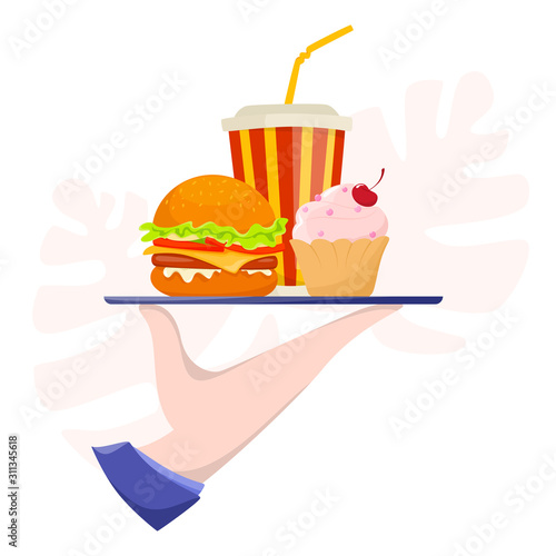 Human hand holding a tray with fast food