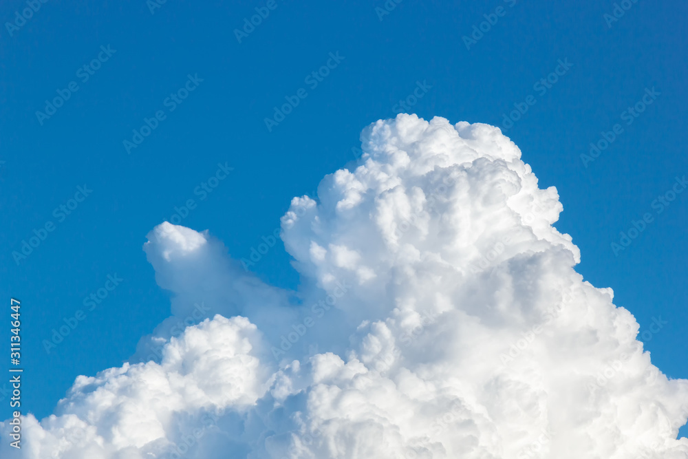 cumulus and high-cumulus clouds of an average tier on blue heavenly space cumulus and high-cumulus clouds of an average tier on blue heavenly space