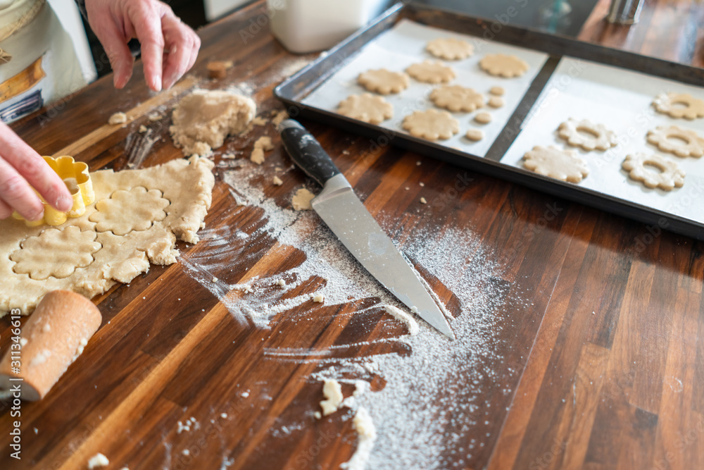 Cutting and making homemade cookies