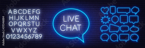 Live chat neon sign on the wall background. Set of neon speech bubbles and the alphabet.