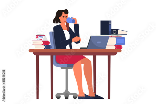 Exhausted businesswoman drinking coffee in the office. Deadline concept.