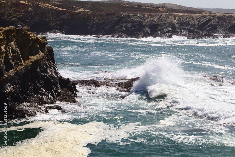 Wave smashing the Portigal Coast