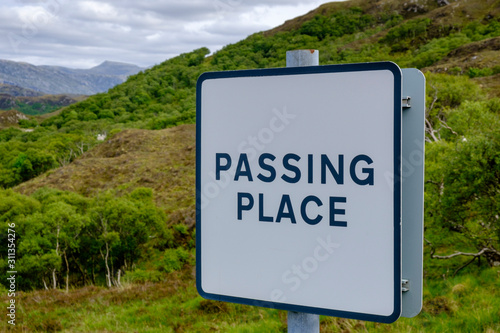 Passing place sign to allow overtaking on a narrow road, in Scotland