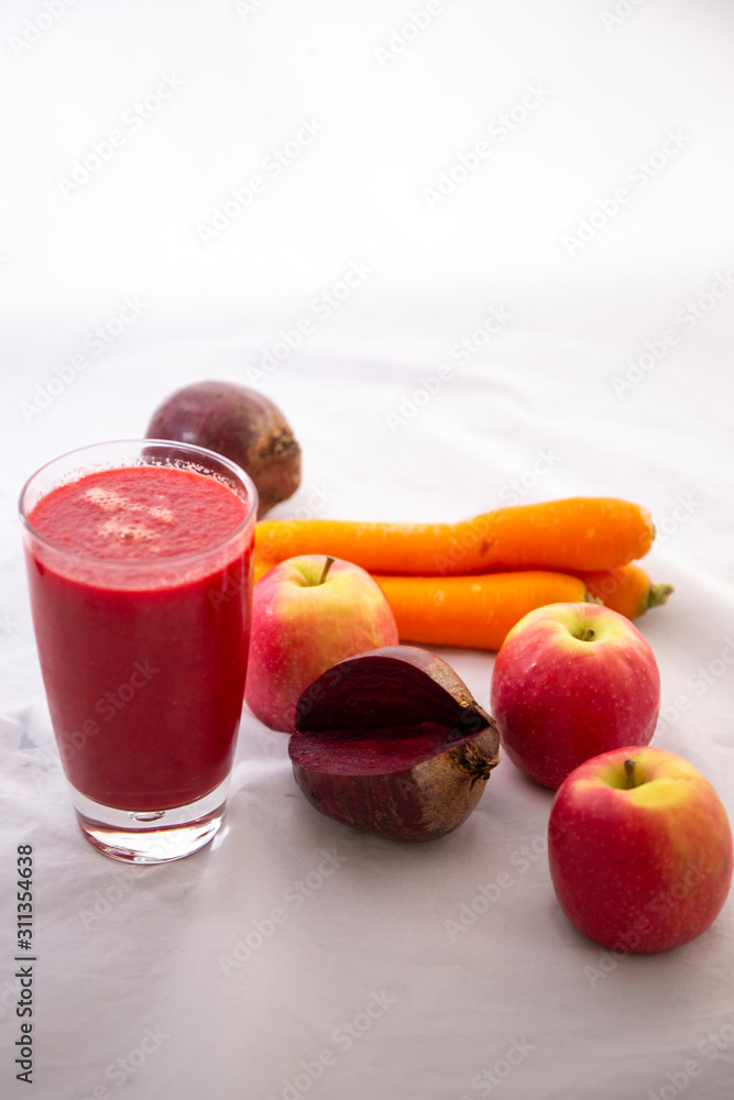 Apple, Carrot, Beetroot juice with juice mixer Apple, Carrot, Beetroot juice with juice mixer
