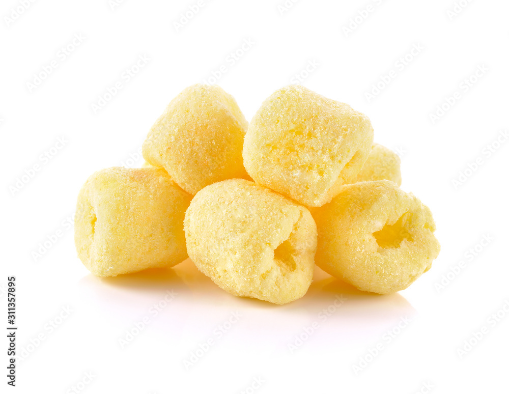 Crunchy corn snacks milk flavour on white background Crunchy corn snacks milk flavour on white background