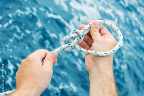 Making of nautical bowline knot