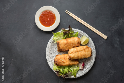 Fried chinese spring rolls with sweet chili sauce